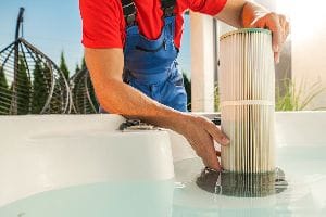 Person Changing Hot Tub Filter
